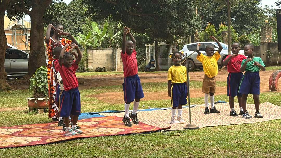 Children learning together at His Grace School classroom in Kira
